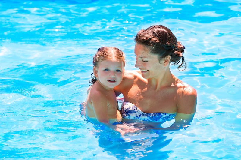 Mother and Daughter in Pool